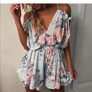 Floral romper ruffle open back